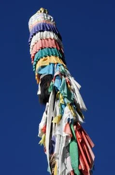 Prayer flags column in tibet Stock Photos