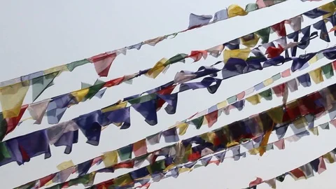 Prayer flags flying from Boudhanath Stupa, Buddhist Temple naer Kathmandu, Nepal Stock Footage 90609091