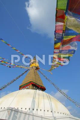 Prayer flags flying over Bodhnath Stupa, Asia's largest stupa