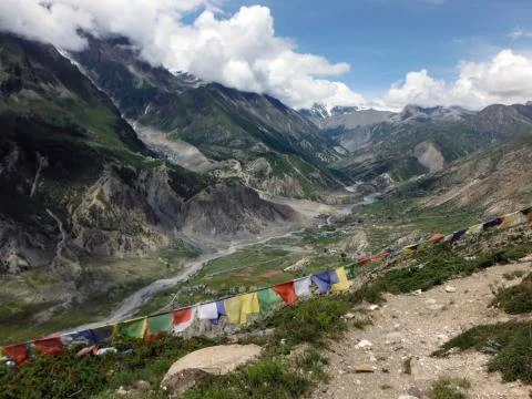 Prayer flags in Himalayan valley Stock Photos