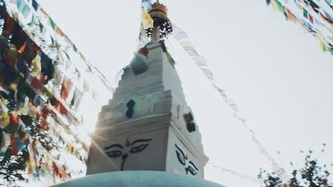 Prayer flags lungta at Stupa in sunrise lights. 스톡 동영상 91616587