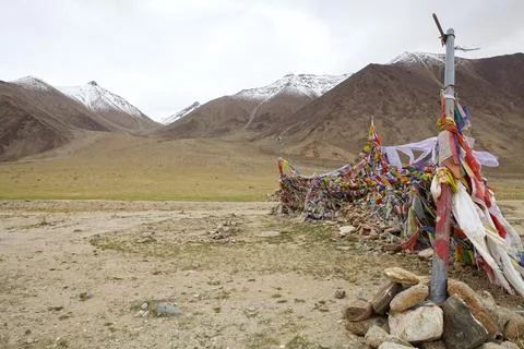 Prayer flags at the mountain pass in Ladakh, India Stock Photos