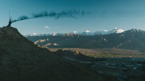 Prayer flags moving in wind with leh city under in sunset Video stock 54624609