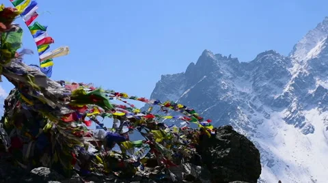 Prayer flags shken by the wind at  Himalaya Nepal Stock Footage 62537639