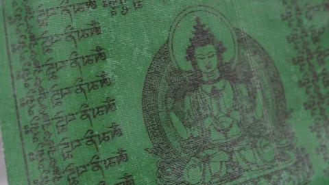 Prayer flags swaying under the snow . Shallow depth of field. Stock Footage 104657459