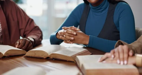 Prayer, group and hands with scripture, bible study or explanation of verse for Video stock 312689585