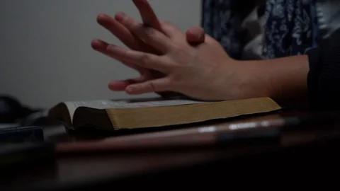 Prayer hands with Bible Stock Footage 107325805