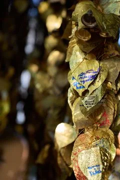 Prayer leaves hanging down at a temple in Bangkok, Thailand 31 January, 2025 Stockfoto's