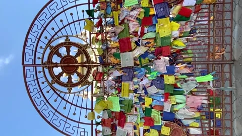 Prayer multicolored flags on the gates of a Buddhist temple Stock Footage 202323406
