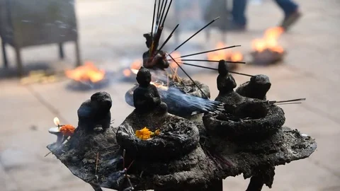 Prayer offering, Incense burning at Nepal Hindu temple - Diwali Festival Stock Footage 79856689