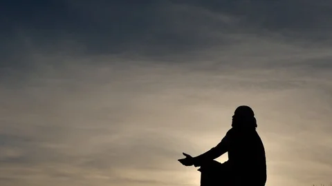 Prayer with putted forward hands silhouette Видео 88708527