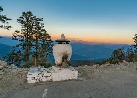 Prayer stupa with Dochula Pass background Stock Photos
