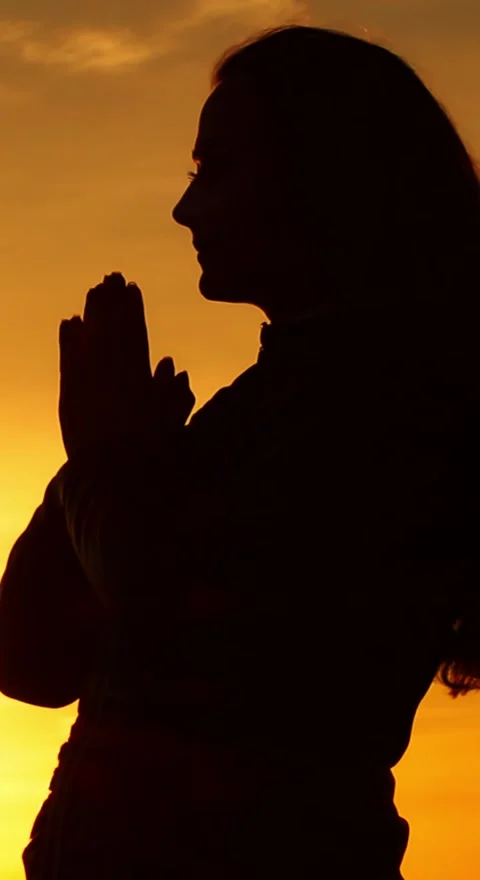 Prayer at sunset Stock Footage 249725670