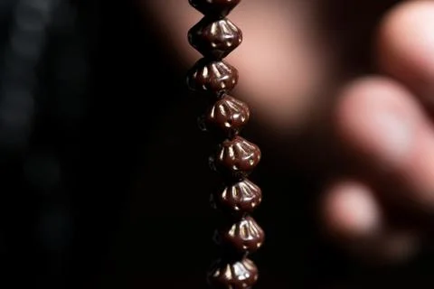 Prayer using rosary Stock-Fotos