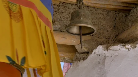 Prayer wheel with bell Stock Footage 128240782