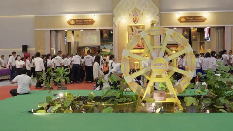 Prayer Wheel &amp; Thai School Students In Uniform At Visakha Bucha Day Festival Stock Footage 249971037