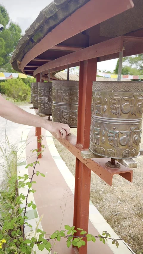 Prayer wheels spinning buddhism stupa Stock Footage 311479741