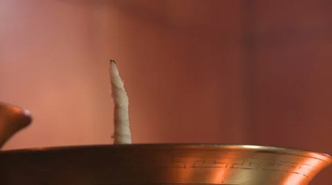 Prayer wig is being lit with a match Video stock 10787535