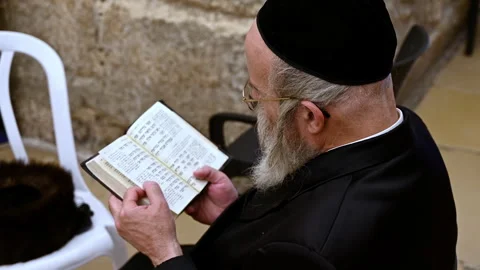 Prayers at the wailing wall in jerusalem by orthodox jews Stock Footage 337890181