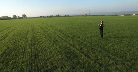 Praying on a Beautiful Field Stock Footage 56350882