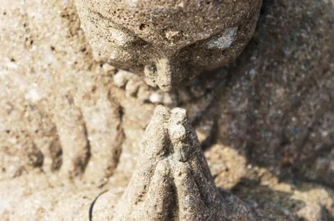 Praying buddha Stock Photos