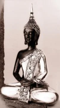 Praying buddha Stock Photos