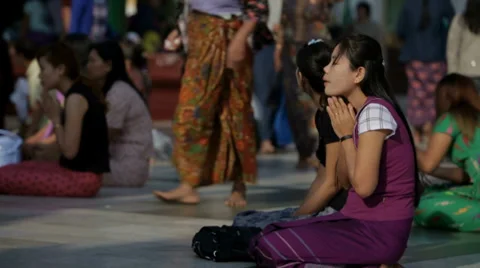 Praying at the Buddhist Temple in Burma Stock Footage 36416022