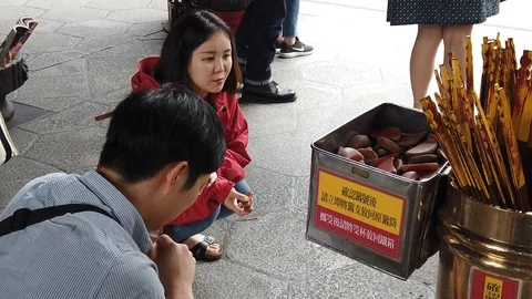 Praying in a Buddhist Temple Video stock 106706156