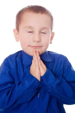 Praying child Stock Photos