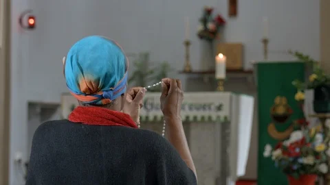Praying in Church Stock Footage 97702987