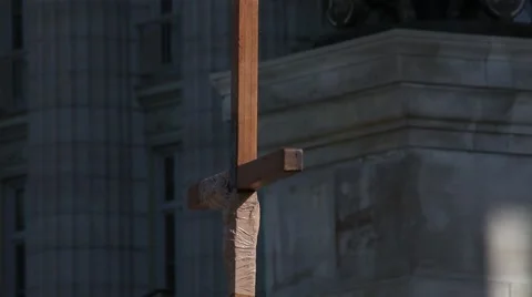 Praying in Circle Around Cross - Pan Down Stock Footage 45362571