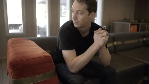 PRAYING ON A COUCH Stock Footage 86085366