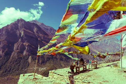 Praying flags on mountain background. Stock Photos