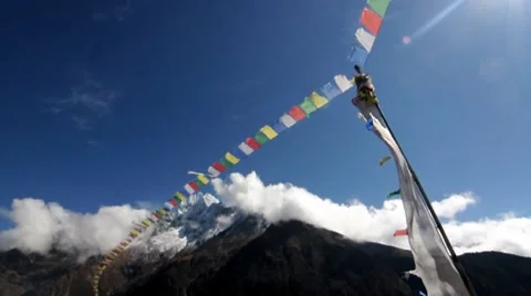 Praying flags on strong wind in Himalayas Nepal Stock Footage 7974922