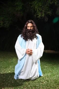 Praying at Gethsemane Stock Photos