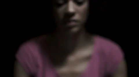 Praying with hands clasped together on dark black background. Vídeo Stock 32958499