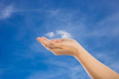 Praying Hands Isolated on sky background. Stock Photos