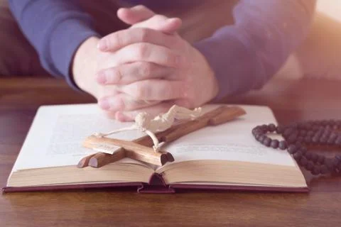 Praying hands of man Stock Photos