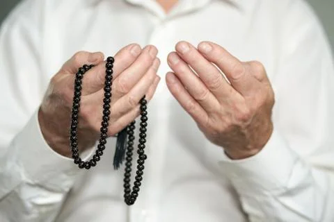Praying hands of an old man Фото