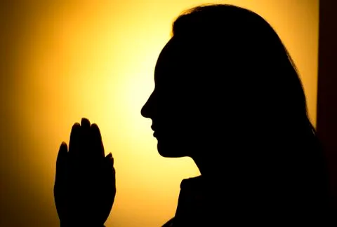 Praying hands Stock Photos