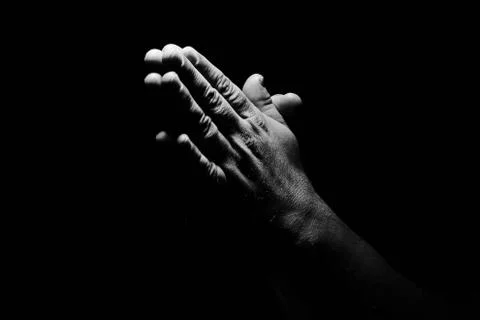 Praying hands Stock Photos