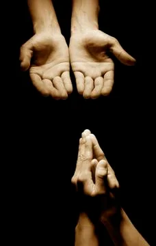 Praying hands Stock Photos