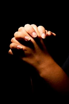 Praying hands Stock Photos