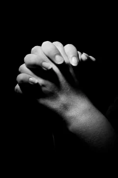 Praying hands Stock Photos