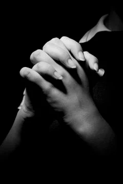 Praying hands Stock Photos