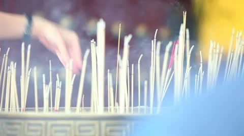 Praying incense Stock Footage 10886913