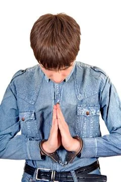 Praying Man in Handcuffs Stock Photos