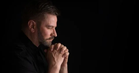 Praying man - Side Profile Stock Photos