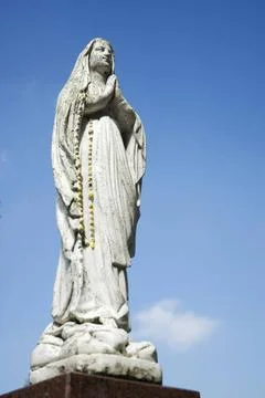 Praying Mary Mary is praying in devotion Copyright: xZoonar.com/IvonnexWie... Stock Photos