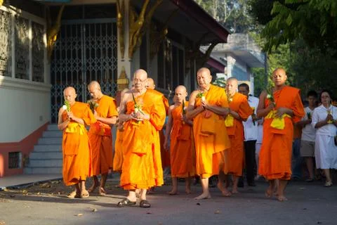 Praying monks Stock Photos